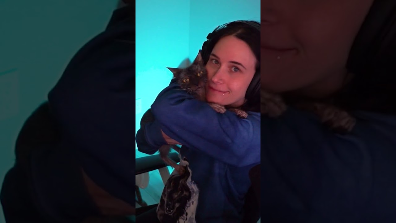 Pip loves the cuddles but pretends she doesn't