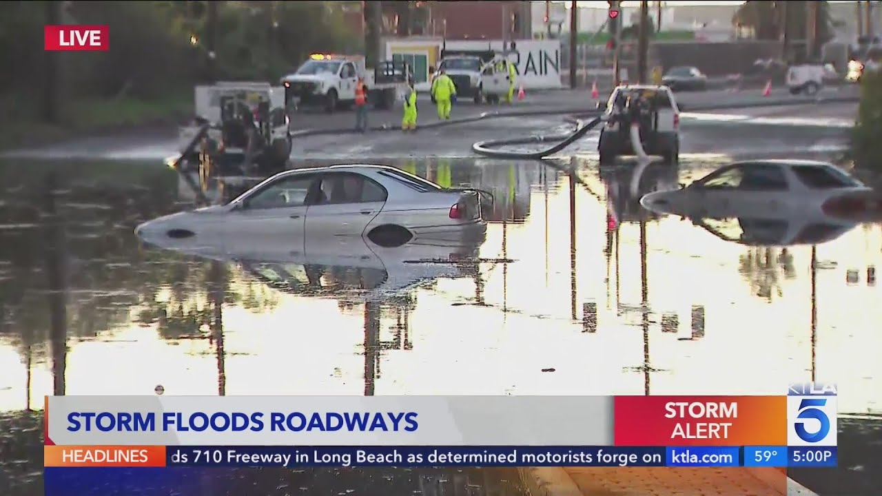 Powerful storm arrives, flooding roads and bringing snow to Southern ...