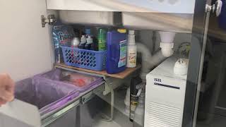 How to install an under-sink waste bin (in Palm Lake homes).
