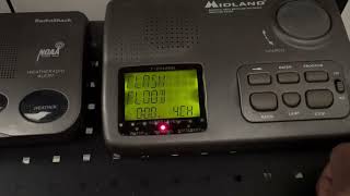 what happens when you move a Midland 74-210/WR-30's scroll wheel while its decoding an alert