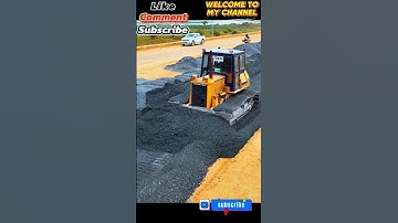 Nice Works KOMATSU D53P: Bulldozer At Work Leveling Gravel Stones for New Roads