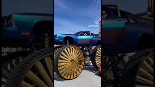 now check this out this Chevy is real crazy with the rims