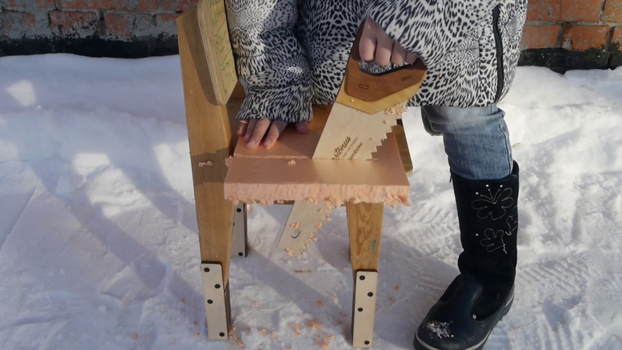 Handsaw test. Wooden toy tool