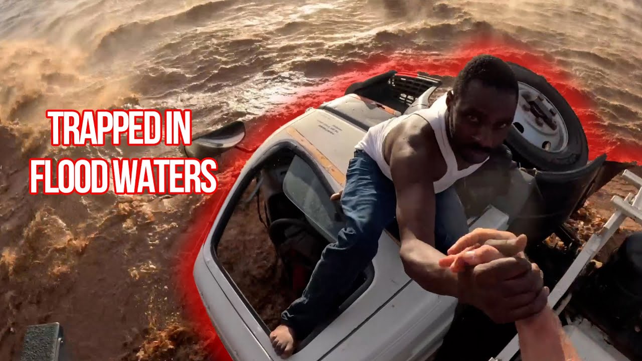 Kenya: Man Is Rescued From A Car Trapped In Flood Waters - YouTube