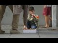 The littlest flutist, Syrian refugee boy