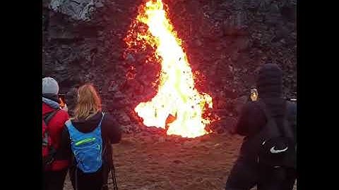 Visitors Witnessing Lava up-Close as It Flows From Volcanic Eruption