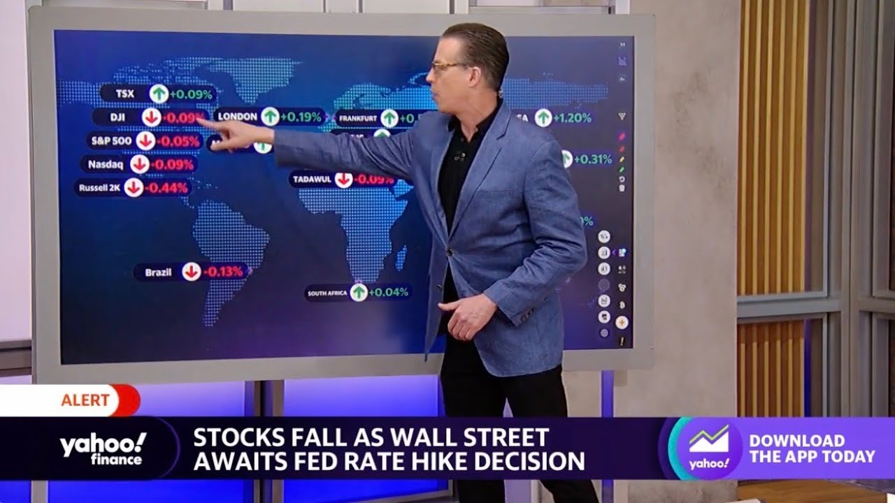 Stocks fall as Wall Street awaits Fed rate hike decision - YouTube