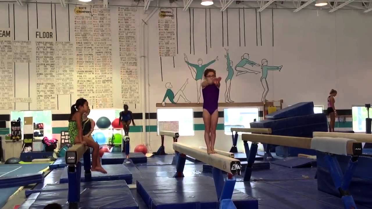 Naperville Gymnastics Marissa Swanson Backhandspring on BEAM!