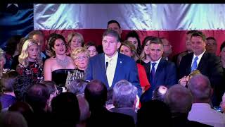 Manchin celebrates win, bashes Trump