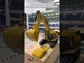 Before powering on the 1/14 6015B Hydraulic Excavator, make sure every single door is closed tight