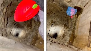 GUY THROWS RANDOM OBJECTS DOWN OLD MINESHAFT