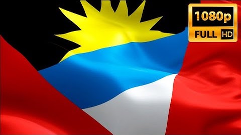 Antigua and Barbuda flag video waving in wind. Realistic St. John