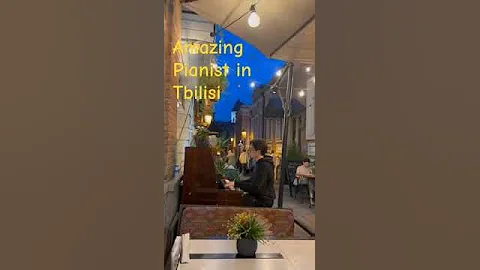 Enjoy a relaxing piano concert in Tbilisi, Georgia with this amazing pianist (in Cafe Opinion)