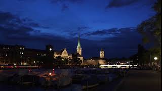 timelapse of the zurich switzerland skyline and river at night