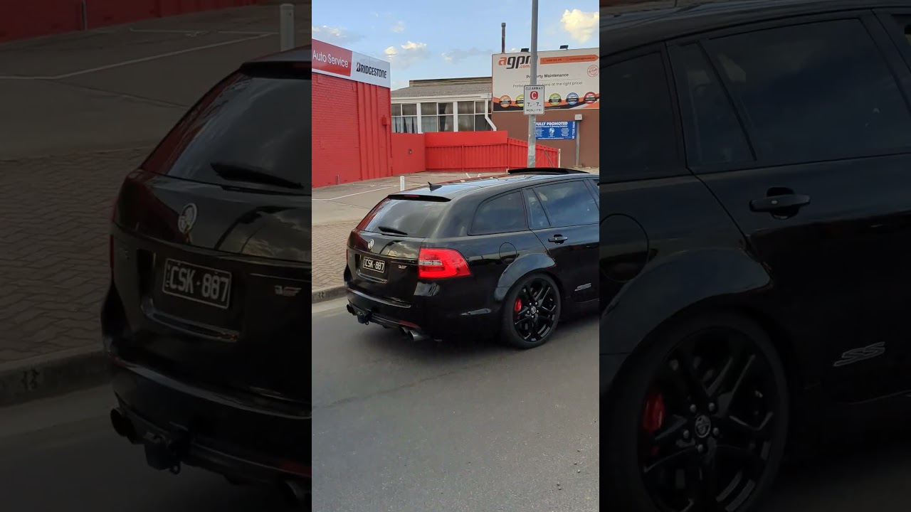Black Holden Commodore Wagon leaving Australia day weekend meet | 