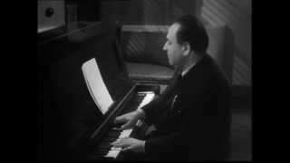 Footage of Erich Wolfgang Korngold (playing the piano)