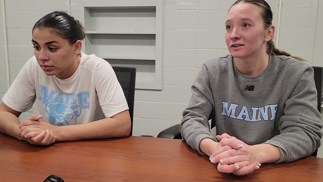 Anne Simon and Adrianna Smith postgame after a loss to James Madison University