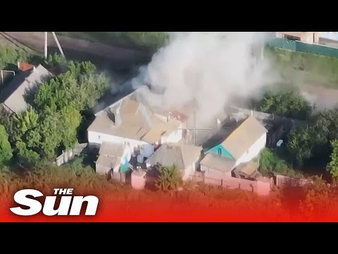 Russian soldiers run for their lives as Ukrainian troops bomb occupied house.