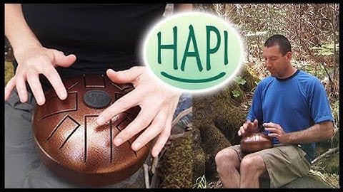 Hapi Mini Steel Tongue Drum in D Akebono with hands and mallets - hapidrum.com