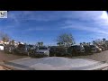Reversing cars bump each other in parking lot