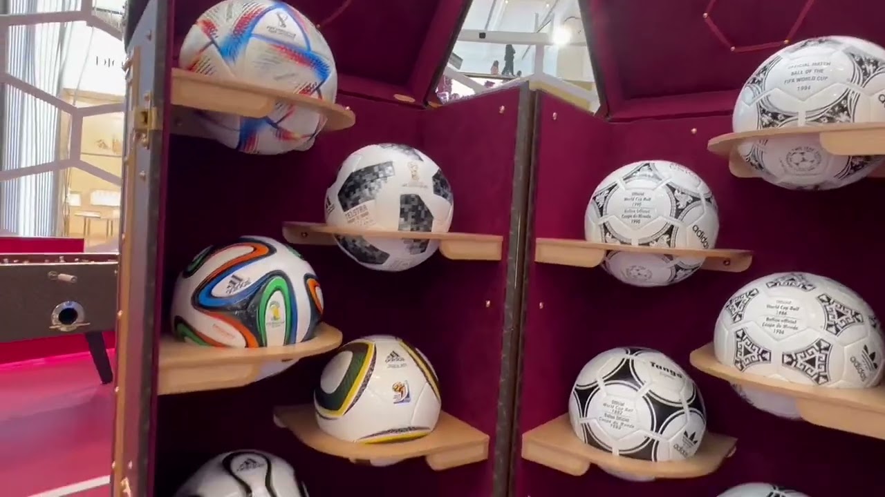 A Louis Vuitton trunk with World Cup match balls from 1970 for