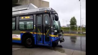 Buses at Coq Central in the rain