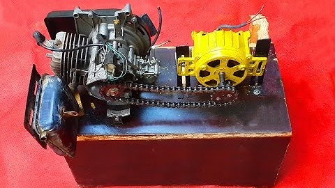 Homemade Dynamo Generator 220V Attached To Two Stroke Engine. DIY Free Electricity Dynamo Generator.