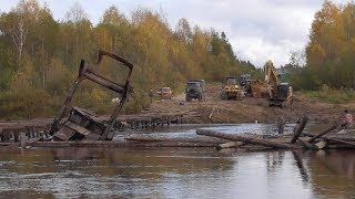 Последние новости с реки. Утопленные трактора на берегу.