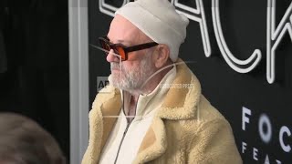 Michael Stipe rules out R.E.M. reunion, as he arrives at the New York premiere of 'Black Bag' Wealth