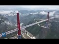 New towering bridge opens to traffic in chinas mountainous guizhou province