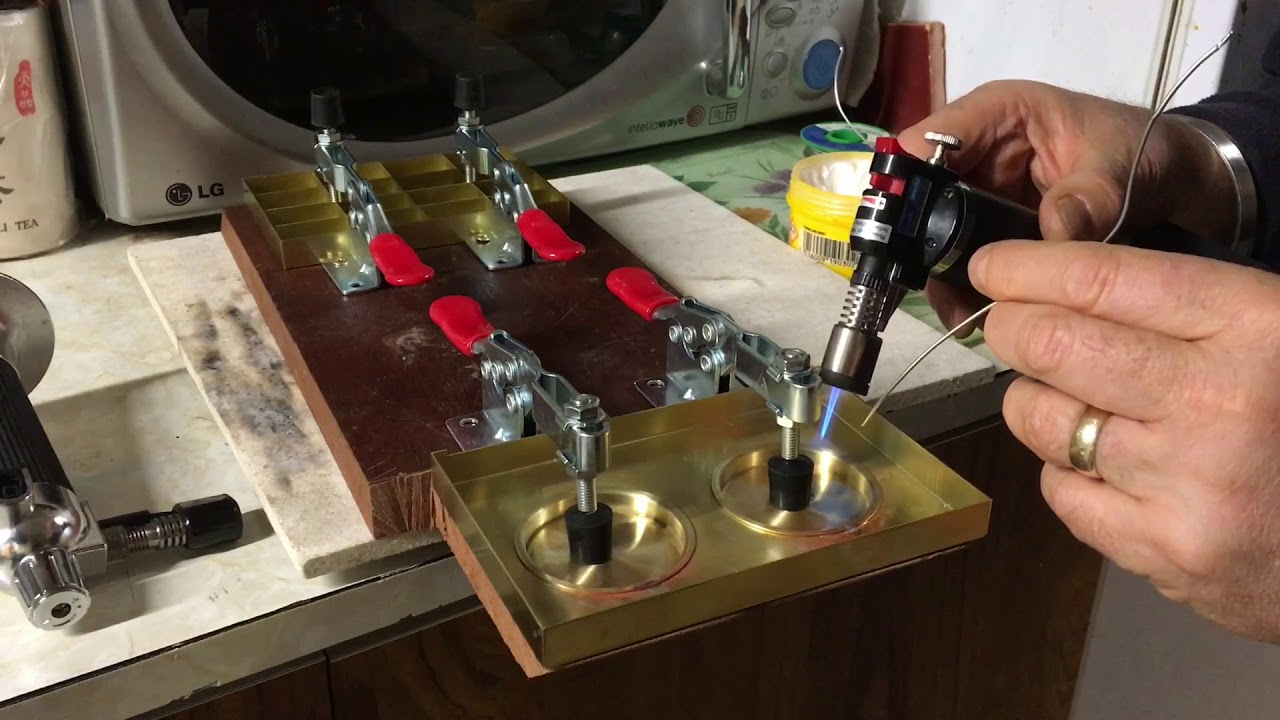 Fitting the mixing pans to a handmade brass paintbox