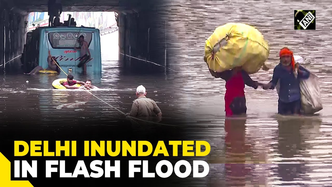 Normal life thrown out of gear as Delhi inundated in flash flood ...