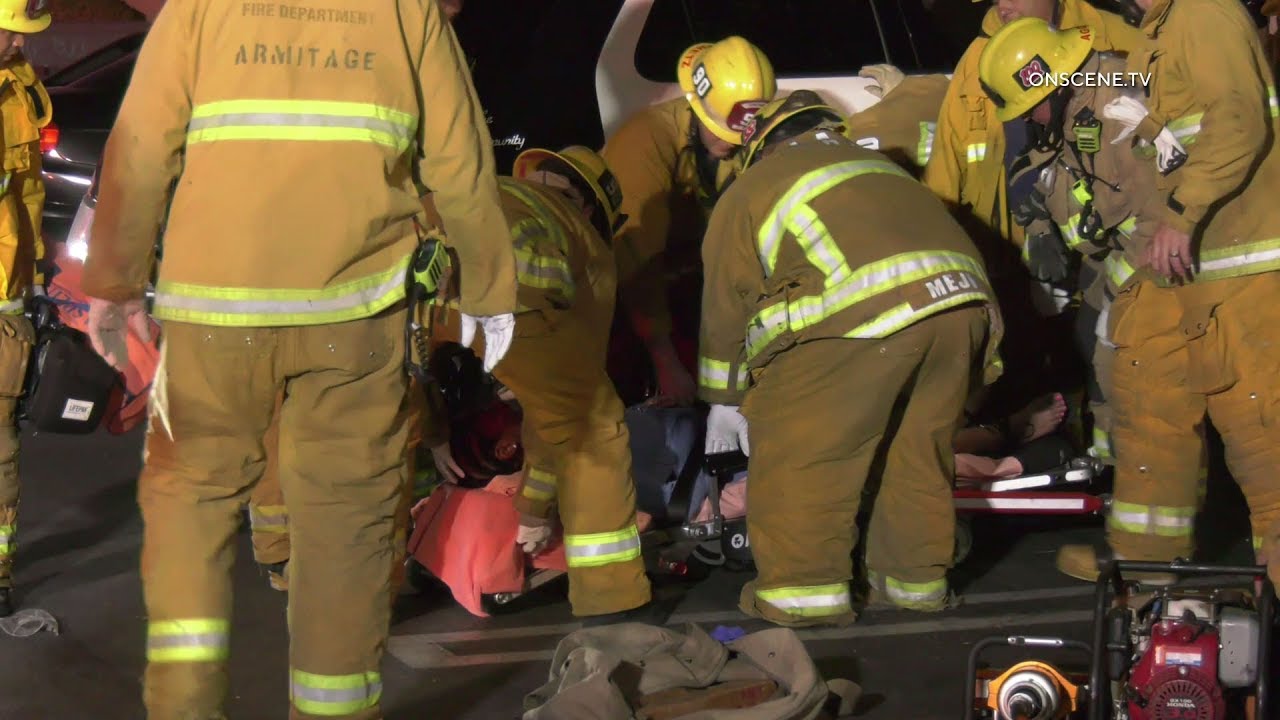 Pedestrian Trapped Under Police Car After Being Struck - YouTube