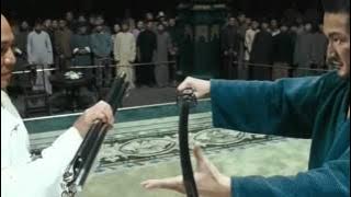 Mestre das armas com Jet Li.