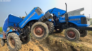 Jcb 3dx Backhoe Loader Machine Loading Mud In Mahindra 475 Di Tractor and Sonalika Di 42 Rx Tractor