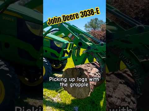 JD 3038E moving logs with ease for a client