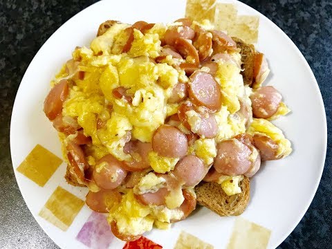 Video: Scrambled Eggs With Sausage, Tomatoes And Cheese - A Step By Step Recipe With A Photo