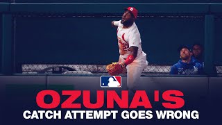 Ozuna's catch attempt goes awry