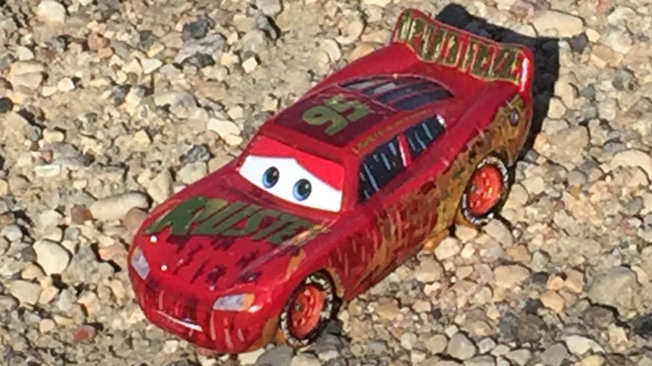 Disney Cars muddy rusteze racing center lightning McQueen diecast review YouTube Disney Cars muddy rusteze racing center lightning McQueen diecast review YouTube