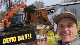 Demolishing a mobile home and clearing brush