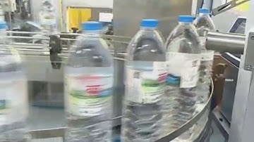 เครื่องพิมพ์วันที่ผลิต วันหมดอายุ | ยี่ห้อ LINX 8900 | บนขวดน้ำ PET