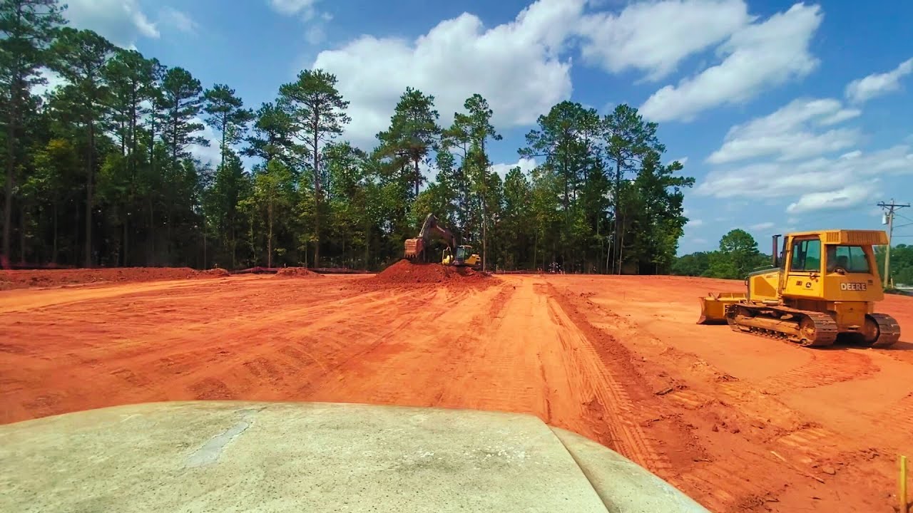 Hauling In Dirt and Grading For A Slab Foundation - YouTube