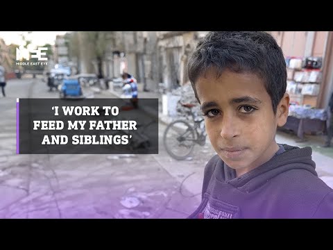 Palestinian boy collects greens near Israeli army and sells them to feed his family in Gaza