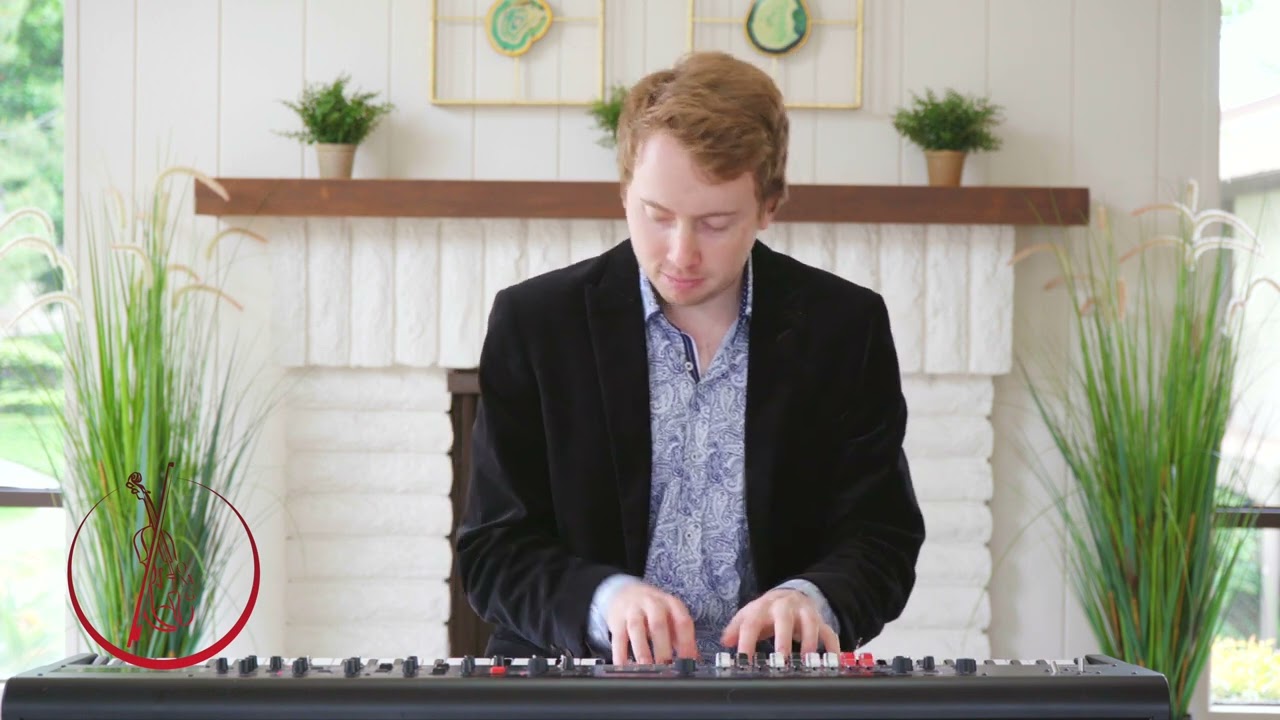Brian performing "Thinking Outloud" by Ed Sheeran on piano
