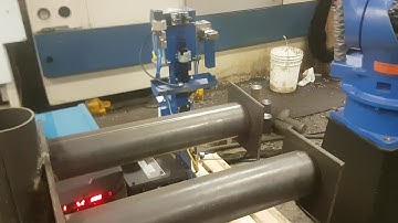 Motoman robots laser scanning to find exact weld position offset for customer in U.S.