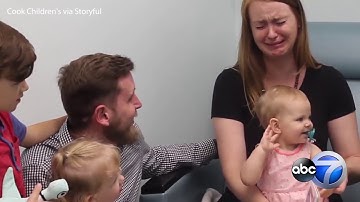 Mom cries as young daughter hears for first time thanks to cochlear implants