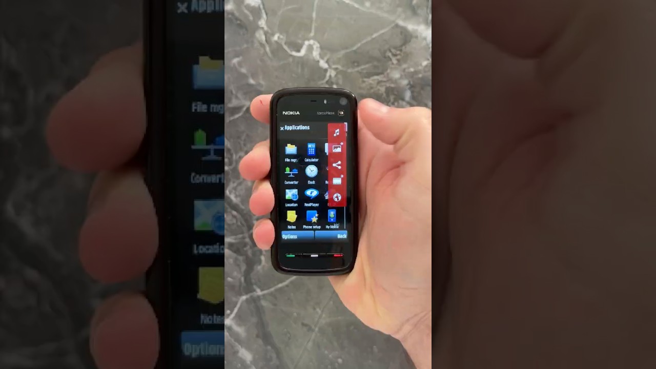 Nokia 5800 XpressMusic: Послушай, там кое-что для тебя  