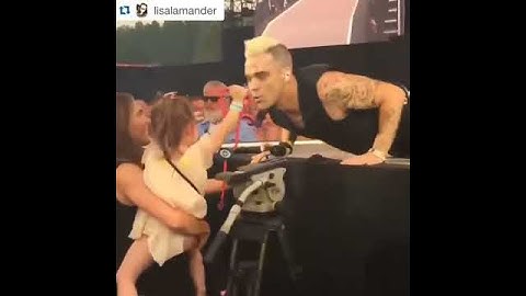 Robbie Williams with his daughter Teddy and wife Ayda