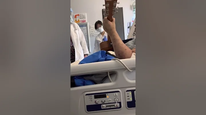 My son playing one more time the guitar for the do...