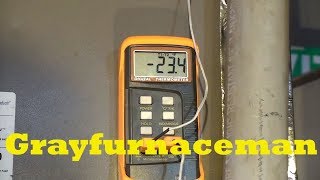 Why is there more humidity in air conditioned discharge air than inlet air